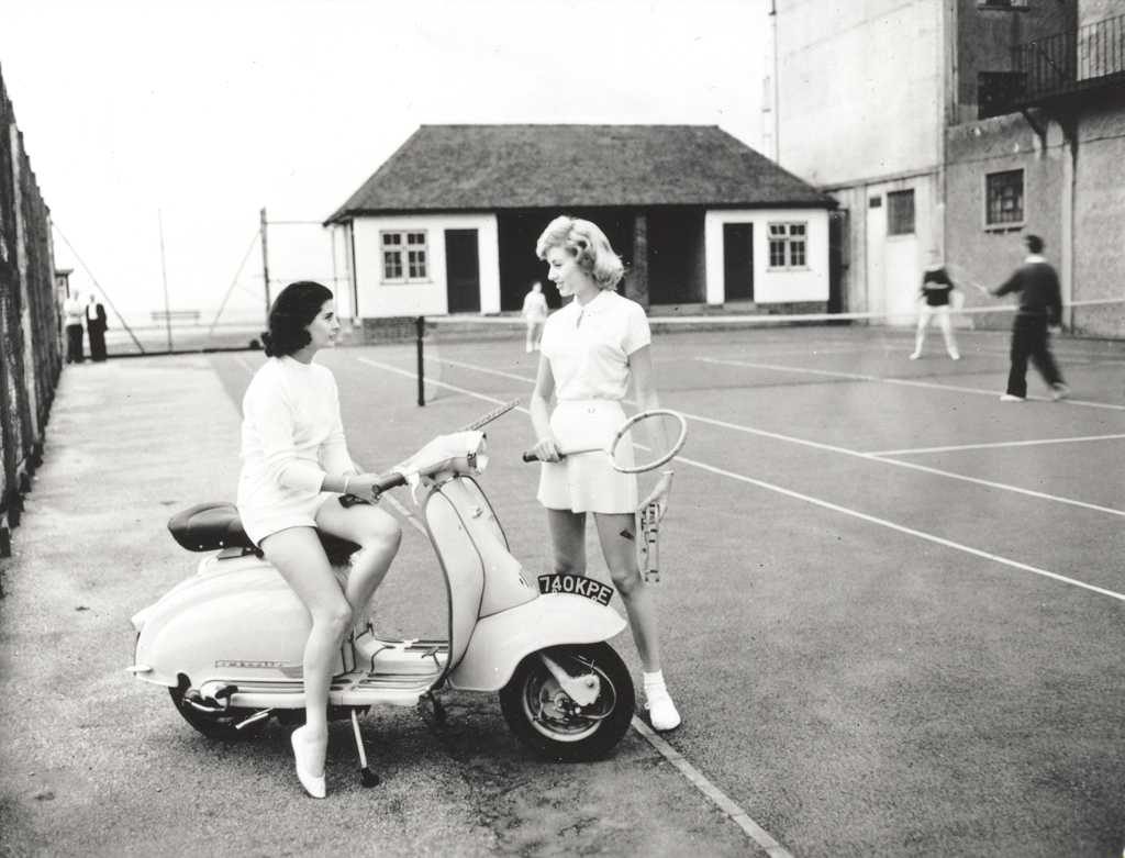 1960 Lambretta scooter and two woman on tennis court