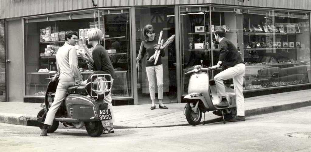 1966 four persons with two Lambretta scooters