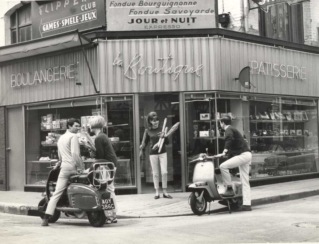 1966 four persons with two Lambretta scooters