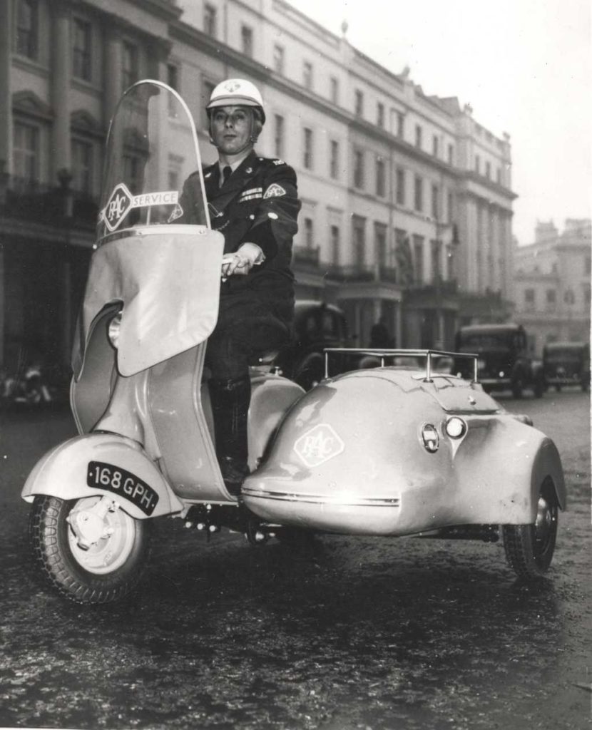 Policeman with Lambretta scooter sidecar